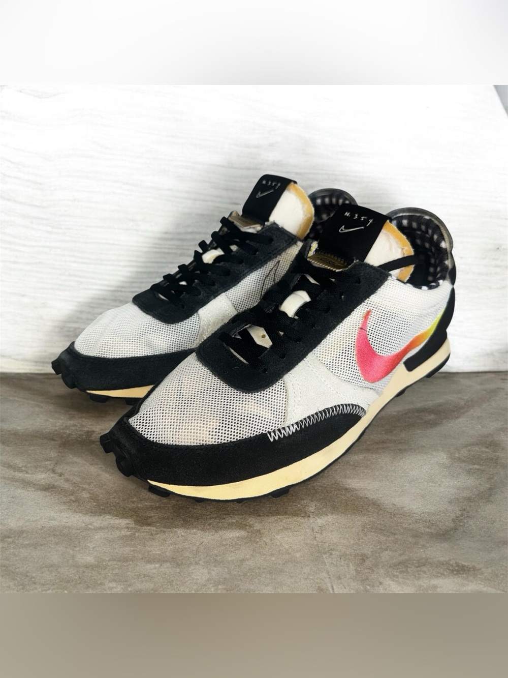 Nike Men’s 39 Ghost White and Black Runner with Pink-to-Yellow Swoosh